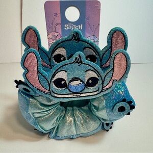 NWT. Disney's Stitch Glitter Scrunchies
Two scrunchies in a fun 3D Stitch design